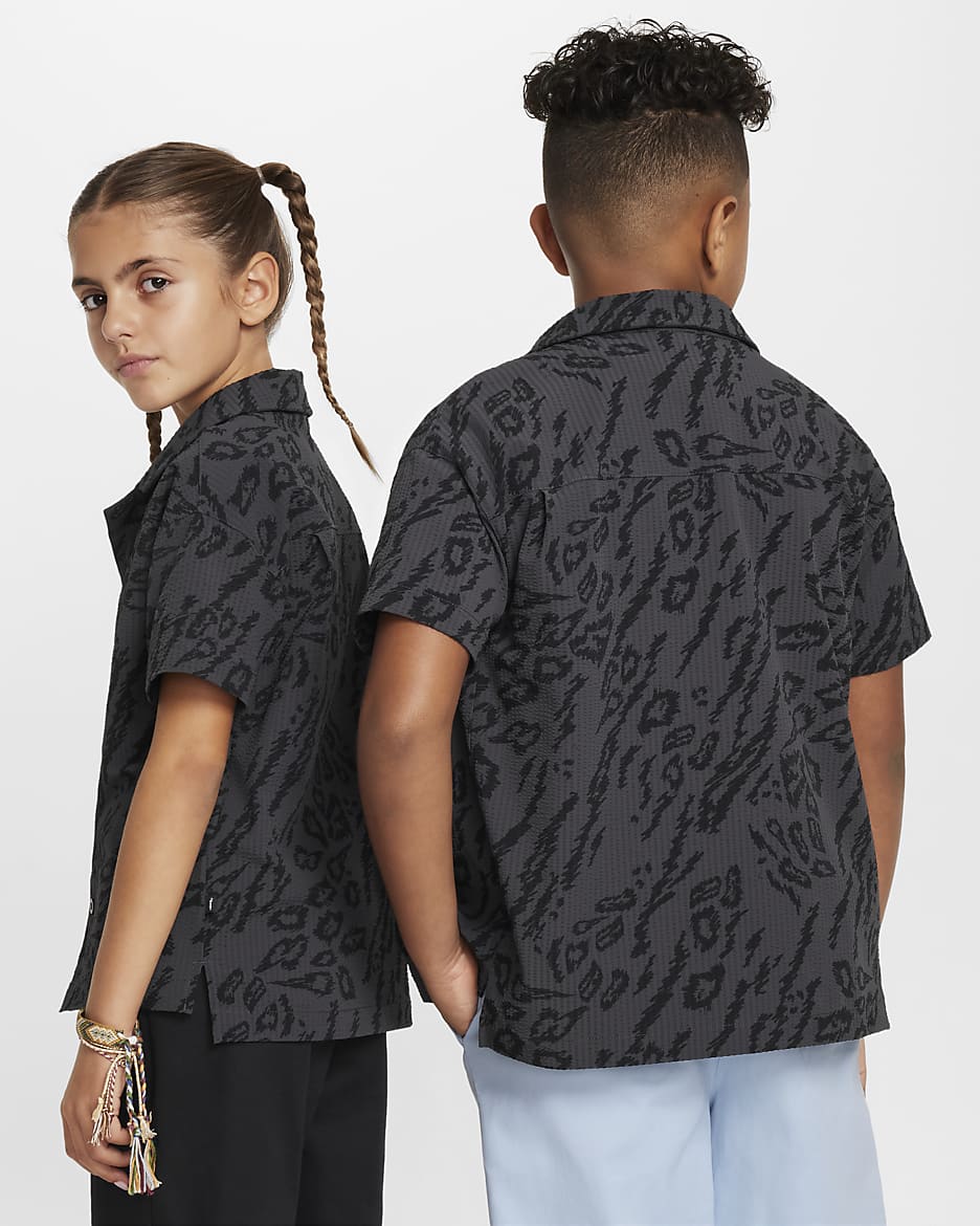 Nike SB Big Kids Dri FIT Button Down Skate Shirt. Nike